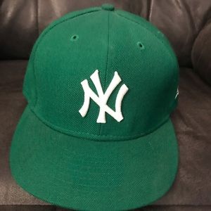 Never worn, green yankee hat